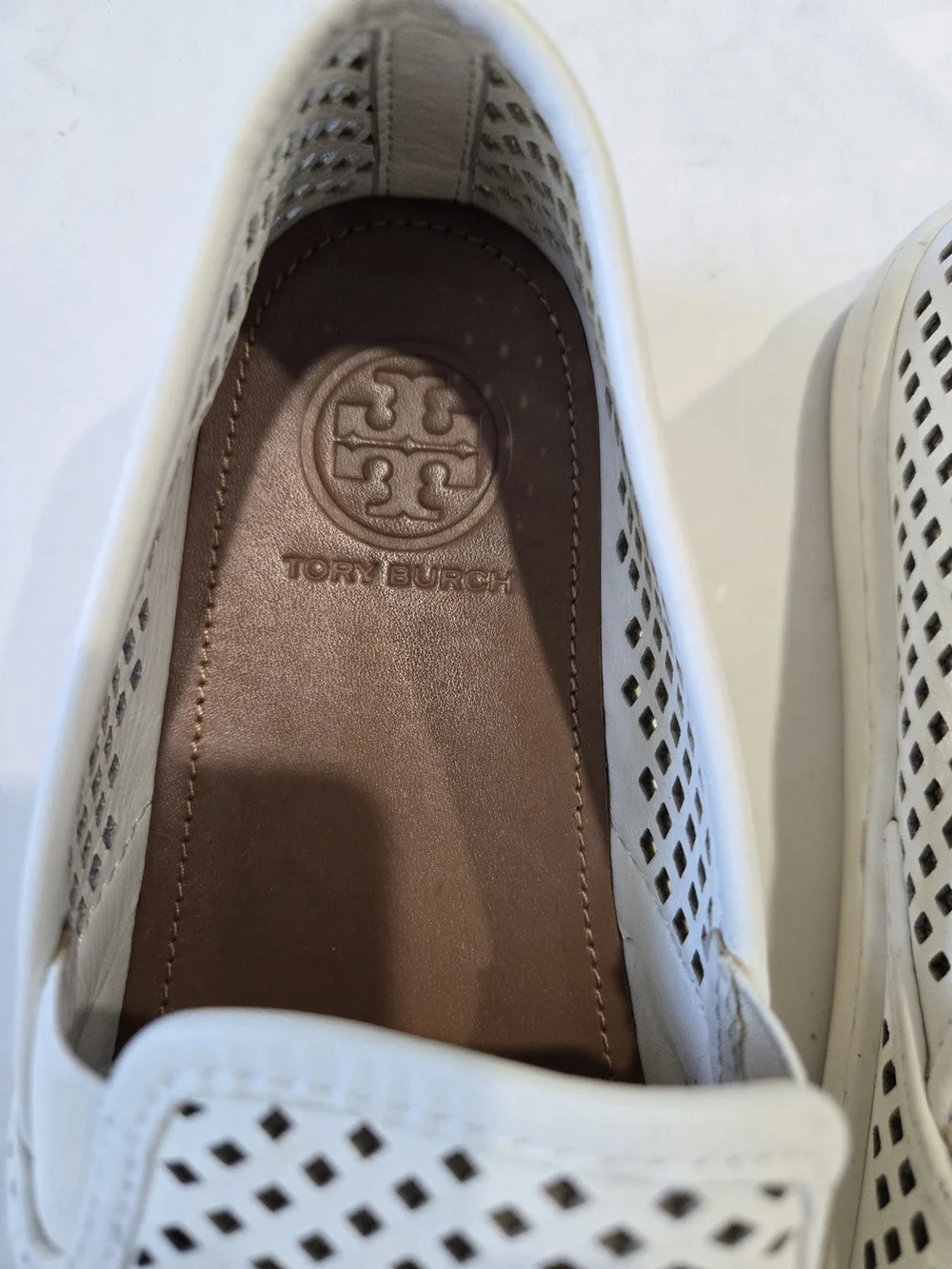 Tory Burch White Perforated Leather Slip-Ons with Brown Insole